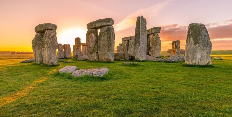 The sun rising over the stone circle